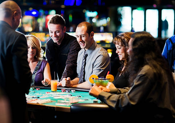 Evolution Gaming baccarat studio on tata mobile phone with dealer and player cards visible